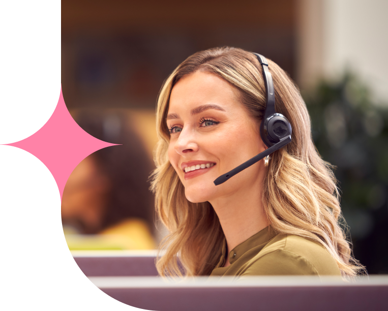 Friendly call handler smiling with headset